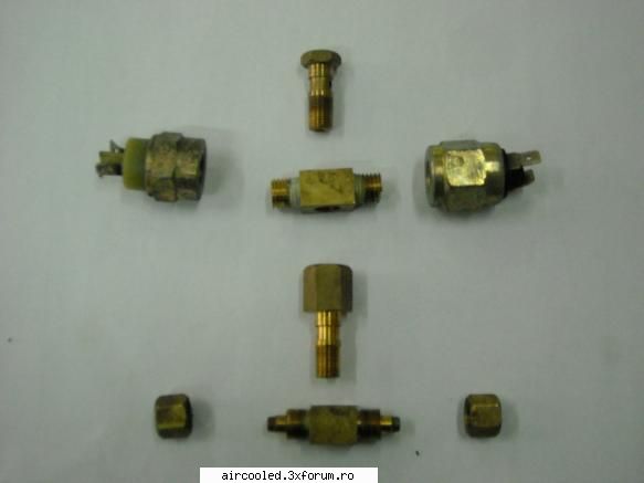 de elemente deja descrise. elementul central este un niplu pt inel rotitor de are filet m10x1 shi